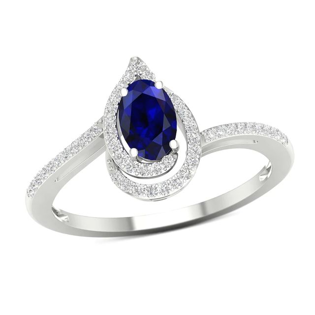 Oval Blue Sapphire and 0.10 CT. T.W. Diamond Flame Spiral Frame Ring in 10K White Gold