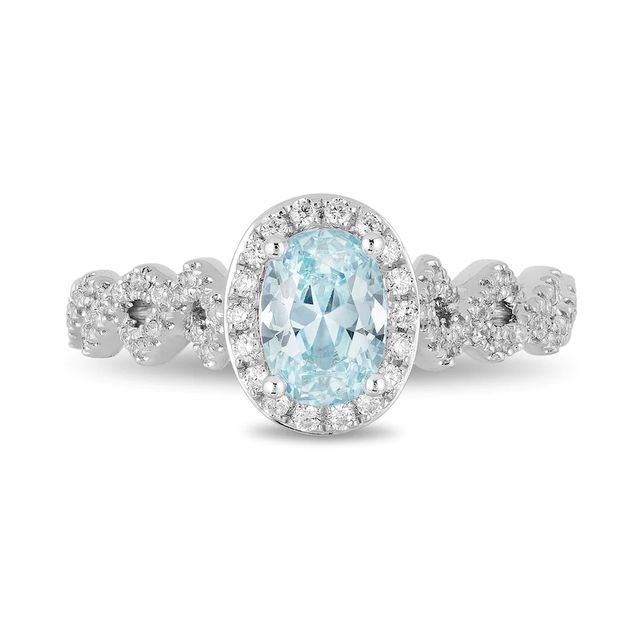 Enchanted Disney Elsa Oval Aquamarine and 0.23 CT. T.W. Diamond Frame Twist Shank Engagement Ring in 14K White Gold