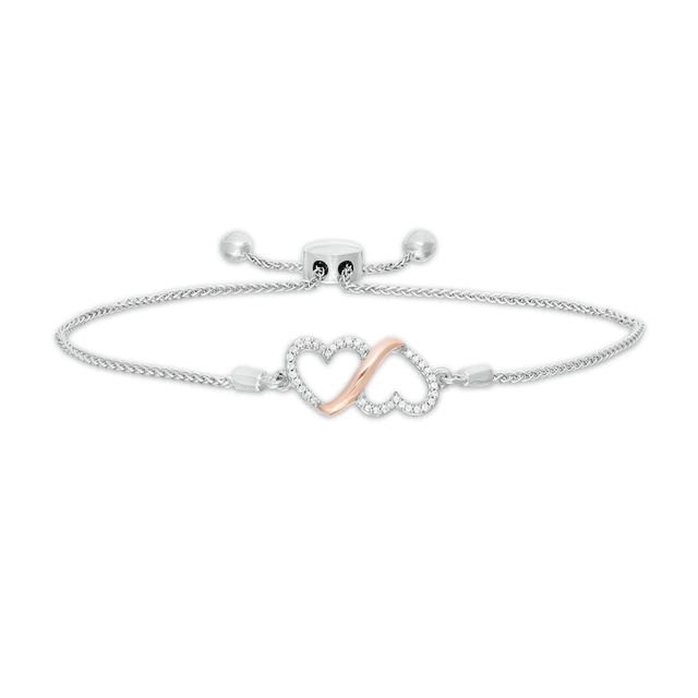 0.10 CT. T.W. Diamond Double Heart Loop Bolo Bracelet in Sterling Silver and 10K Rose Gold - 9.50"|Peoples Jewellers