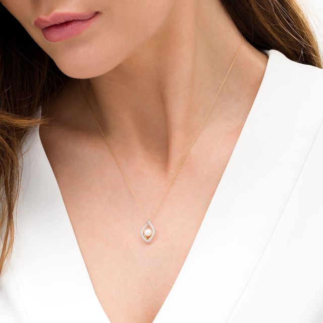 5.0-5.5mm Freshwater Cultured Pearl and White Topaz Double Teardrop Pendant in 10K Gold|Peoples Jewellers