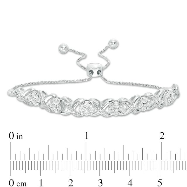 0.09 CT. T.W. Diamond Cascading Infinity with Flowers Bolo Bracelet in Sterling Silver - 9.5"