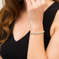 0.45 CT. T.W. Diamond Cascading Bolo Bracelet in Sterling Silver and 14K Gold Plate - 9.5"|Peoples Jewellers