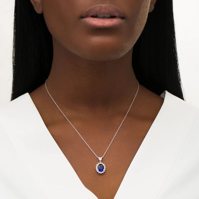 Oval Lab-Created Blue and White Sapphire Starburst Frame Pendant in Sterling Silver|Peoples Jewellers