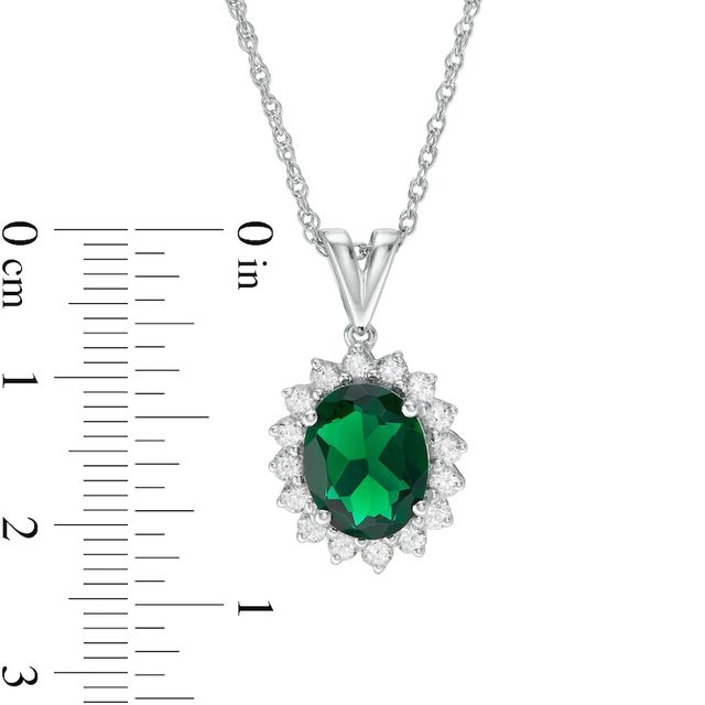 Oval Lab-Created Emerald and White Sapphire Starburst Frame Pendant in Sterling Silver