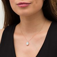 EFFY™ Collection Oval Opal and 0.17 CT. T.W. Diamond Frame Interlocking Drop Pendant in 14K Rose Gold|Peoples Jewellers