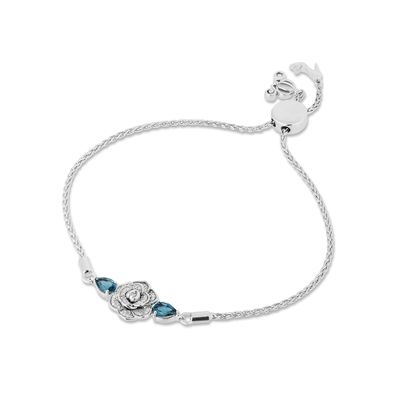 Enchanted Disney Cinderella Pear-Shaped London Blue Topaz and 0.085 CT. T.W. Diamond Bolo Bracelet in Sterling Silver - 9"|Peoples Jewellers