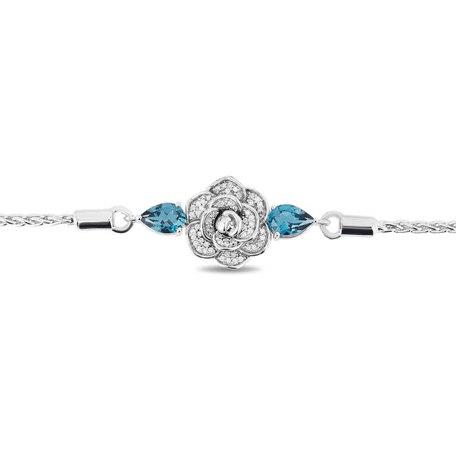 Enchanted Disney Cinderella Pear-Shaped London Blue Topaz and 0.085 CT. T.W. Diamond Bolo Bracelet in Sterling Silver - 9"