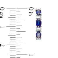 Oval Lab-Created Blue Sapphire and Baguette Diamond Accent Three Stone Hoop Earrings in Sterling Silver|Peoples Jewellers