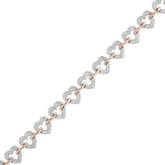 0.10 CT. T.W. Diamond Hearts Bracelet in Sterling Silver and 10K Rose Gold - 7.5"|Peoples Jewellers