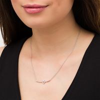 0.04 CT. T.W. Diamond Heart-Shaped Knot Necklace in Sterling Silver|Peoples Jewellers