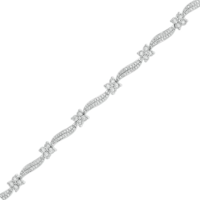 1.00 CT. T.W. Diamond Wavy Flower Station Bracelet in Sterling Silver - 7.25"|Peoples Jewellers