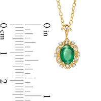 Oval Emerald and 0.05 CT. T.W. Diamond Scallop Frame Floral Drop Pendant in 10K Gold|Peoples Jewellers