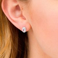 Oval Aquamarine and 0.088 CT. T.W. Diamond Frame Stud Earrings in 10K White Gold|Peoples Jewellers