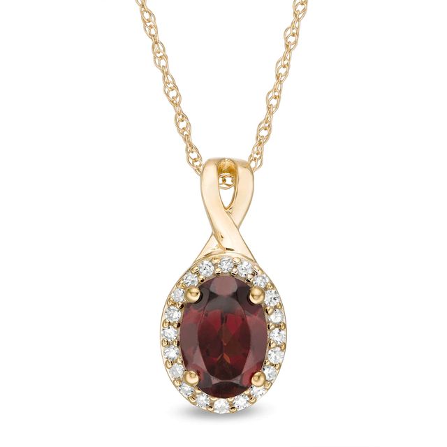 Oval Garnet and 0.08 CT. T.W. Diamond Frame Twisted Split Bail Pendant in 10K Gold|Peoples Jewellers