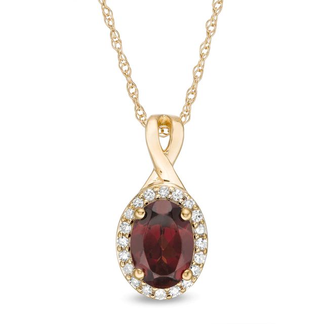 Oval Garnet and 0.08 CT. T.W. Diamond Frame Twisted Split Bail Pendant in 10K Gold