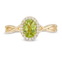 Oval Peridot and 0.08 CT. T.W. Diamond Frame Twist Shank Ring in 10K Gold|Peoples Jewellers