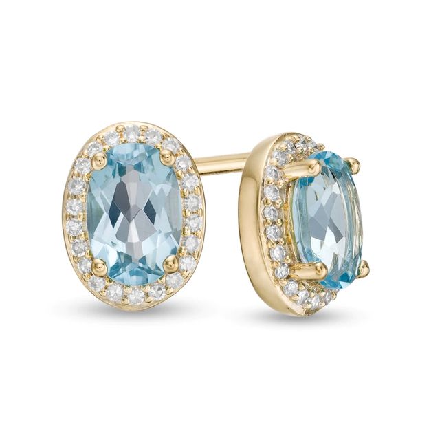 Oval Swiss Blue Topaz and 0.088 CT. T.W. Diamond Frame Stud Earrings in 10K Gold|Peoples Jewellers