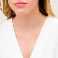 Oval Opal and 0.08 CT. T.W. Diamond Frame Twisted Split Bail Pendant in 10K Gold|Peoples Jewellers