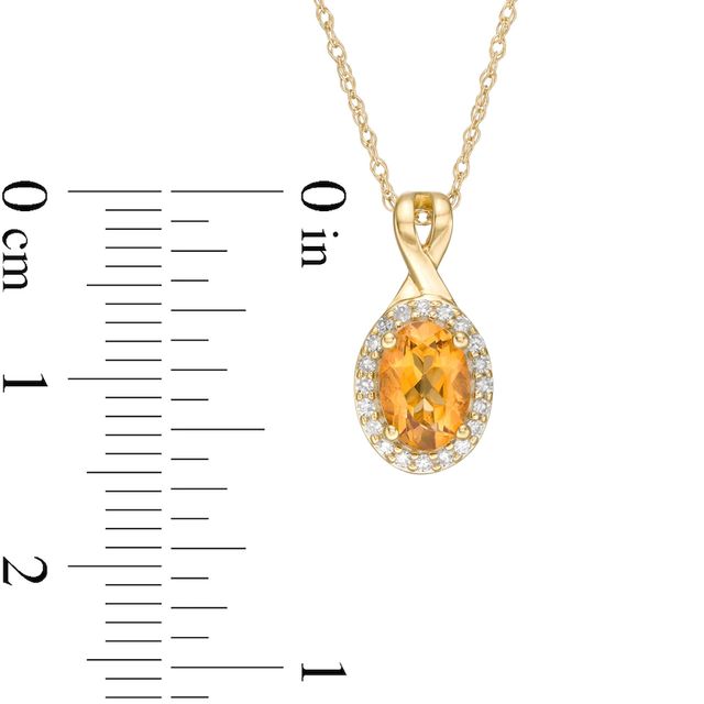 Oval Citrine and 0.08 CT. T.W. Diamond Frame Twisted Split Bail Pendant in 10K Gold|Peoples Jewellers