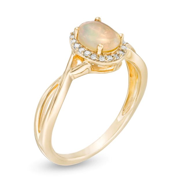Oval Opal and 0.08 CT. T.W. Diamond Frame Twist Shank Ring in 10K Gold|Peoples Jewellers