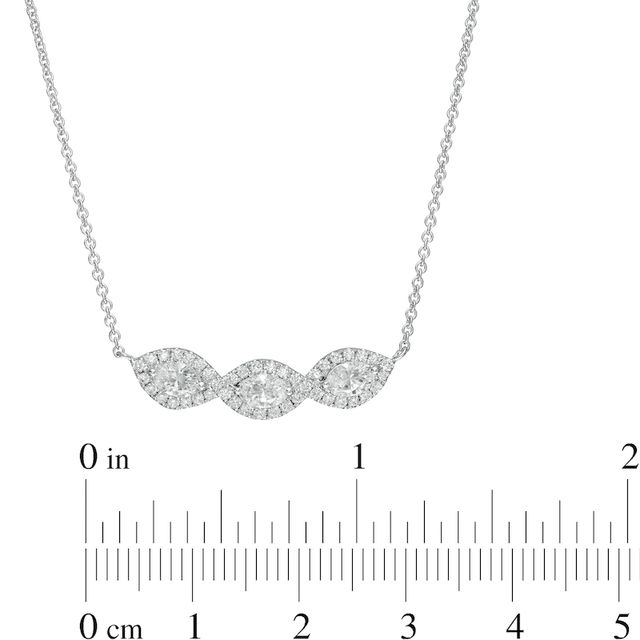 0.95 CT. T.W. Oval Diamond Past Present Future® Twist Frame Necklace in 10K White Gold|Peoples Jewellers