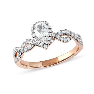 0.75 CT. T.W. Pear-Shaped Diamond Frame Twist Shank Engagement Ring in 10K Rose Gold (I/I1)|Peoples Jewellers