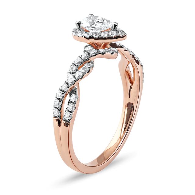 0.75 CT. T.W. Pear-Shaped Diamond Frame Twist Shank Engagement Ring in 10K Rose Gold (I/I1)|Peoples Jewellers