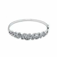 Previously Owned - 0.33 CT. T.W. Diamond Vintage-Inspired Swirl Bangle in Sterling Silver|Peoples Jewellers