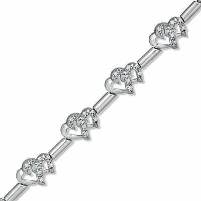 Previously Owned - 0.20 CT. T.W. Diamond Interlocking Hearts Link Bracelet in Sterling Silver|Peoples Jewellers