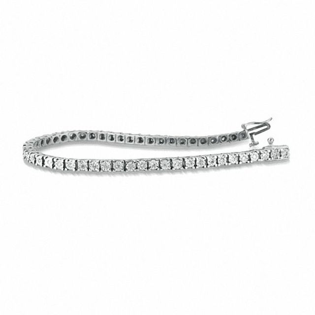 Previously Owned - 1.00 CT. T.W. Diamond Miracle Tennis Bracelet in 10K White Gold|Peoples Jewellers