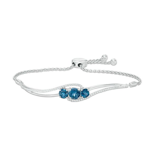 Previously Owned - London Blue Topaz and Lab-Created White Sapphire Three Stone Bolo Bracelet in Sterling Silver - 8.0"|Peoples Jewellers