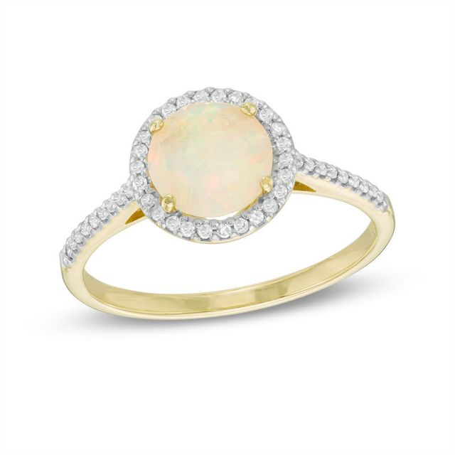 Previously Owned - 7.0mm Opal and 0.13 CT. T.W. Diamond Frame Ring in 10K Gold