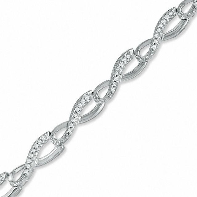 Previously Owned - 0.50 CT. T.W. Diamond Infinity Loop Bracelet in Sterling Silver|Peoples Jewellers