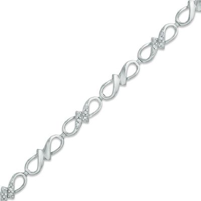 Previously Owned - 0.10 CT. T.W. Diamond Infinity Ribbon Link Bracelet in Sterling Silver - 7.25"|Peoples Jewellers