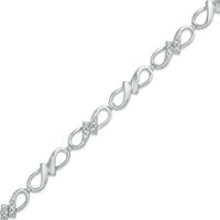 Previously Owned - 0.10 CT. T.W. Diamond Infinity Ribbon Link Bracelet in Sterling Silver - 7.25"|Peoples Jewellers