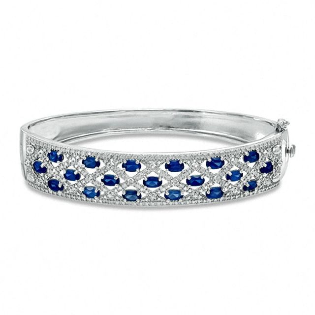 Previously Owned - Oval Lab-Created Blue Sapphire and Diamond Accent Bangle in Sterling Silver - 7.25"|Peoples Jewellers