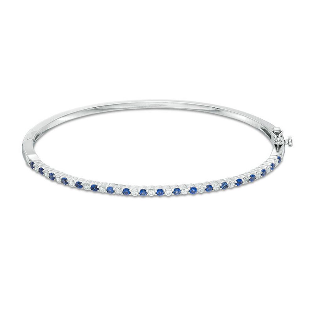 Previously Owned - Alternating Lab-Created Blue and White Sapphire Bangle in Sterling Silver|Peoples Jewellers