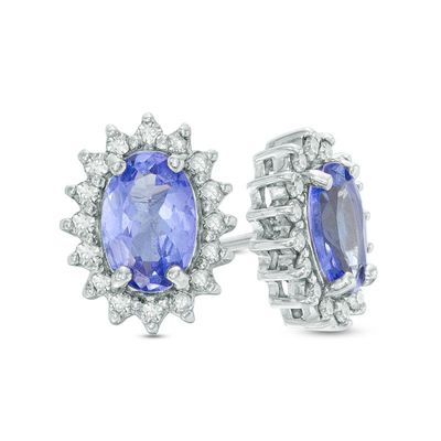 Previously Owned - Oval Tanzanite and 0.16 CT. T.W. Diamond Starburst Frame Stud Earrings in Sterling Silver|Peoples Jewellers