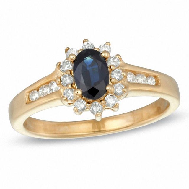 Previously Owned - Oval Blue Sapphire and 0.29 CT. T.W. Diamond Ring in 10K Gold