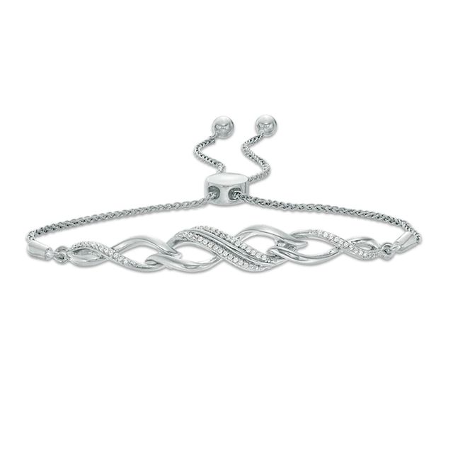 Previously Owned - 0.15 CT. T.W. Diamond Twist Bolo Bracelet in Sterling Silver - 9.5"|Peoples Jewellers