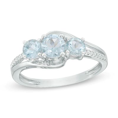 Previously Owned - Aquamarine and 0.04 CT. T.W. Diamond Three Stone Bypass Ring in 10K White Gold|Peoples Jewellers