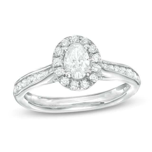 Previously Owned - 1.00 CT. T.W.  Oval Diamond Frame Engagement Ring in 14K White Gold (I/SI2)