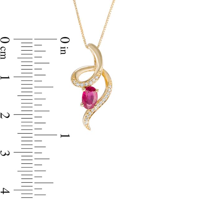 Previously Owned - Oval Ruby and Diamond Accent Looping Ribbon Pendant in 10K Gold|Peoples Jewellers