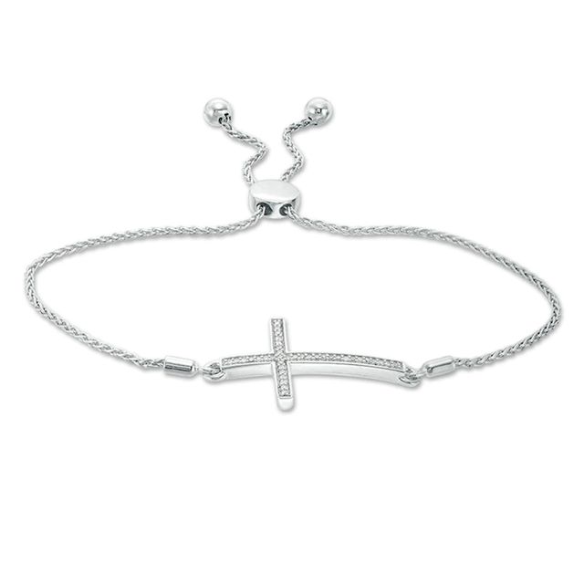 Previously Owned - 0.10 CT. T.W. Diamond Sideways Cross Bolo Bracelet in Sterling Silver - 9.5"