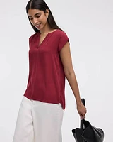 Blouse à manches très courtes et col fendu