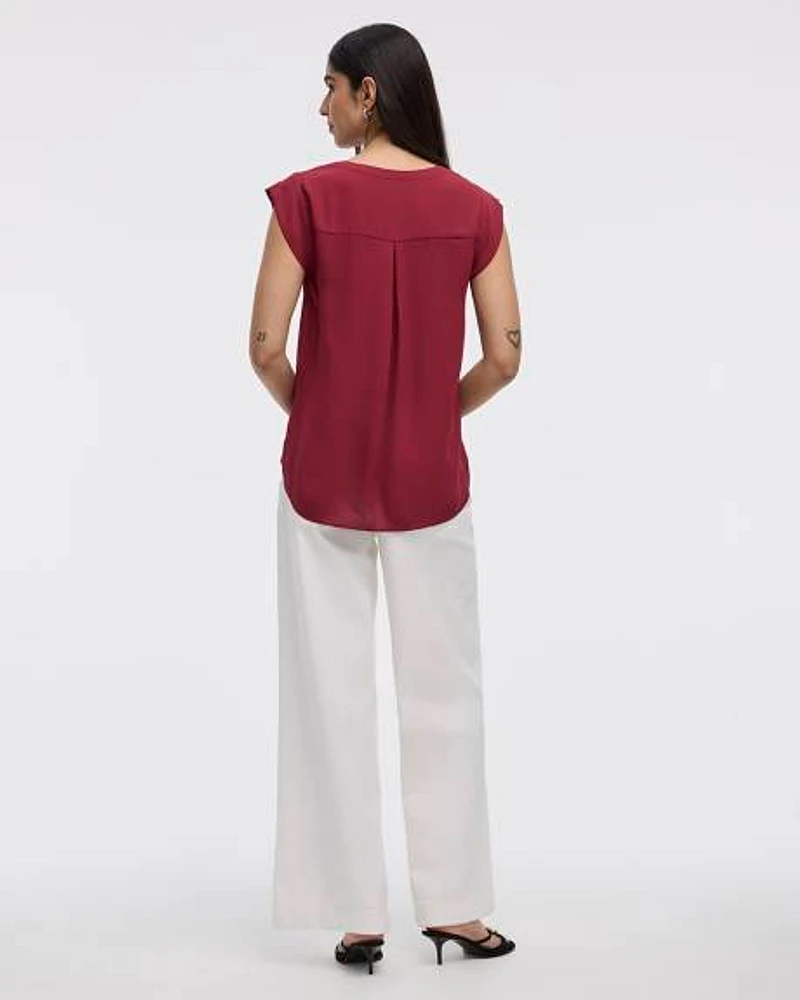 Blouse à manches très courtes et col fendu