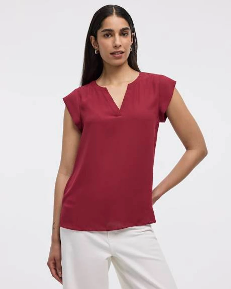 Blouse à manches très courtes et col fendu