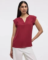 Blouse à manches très courtes et col fendu
