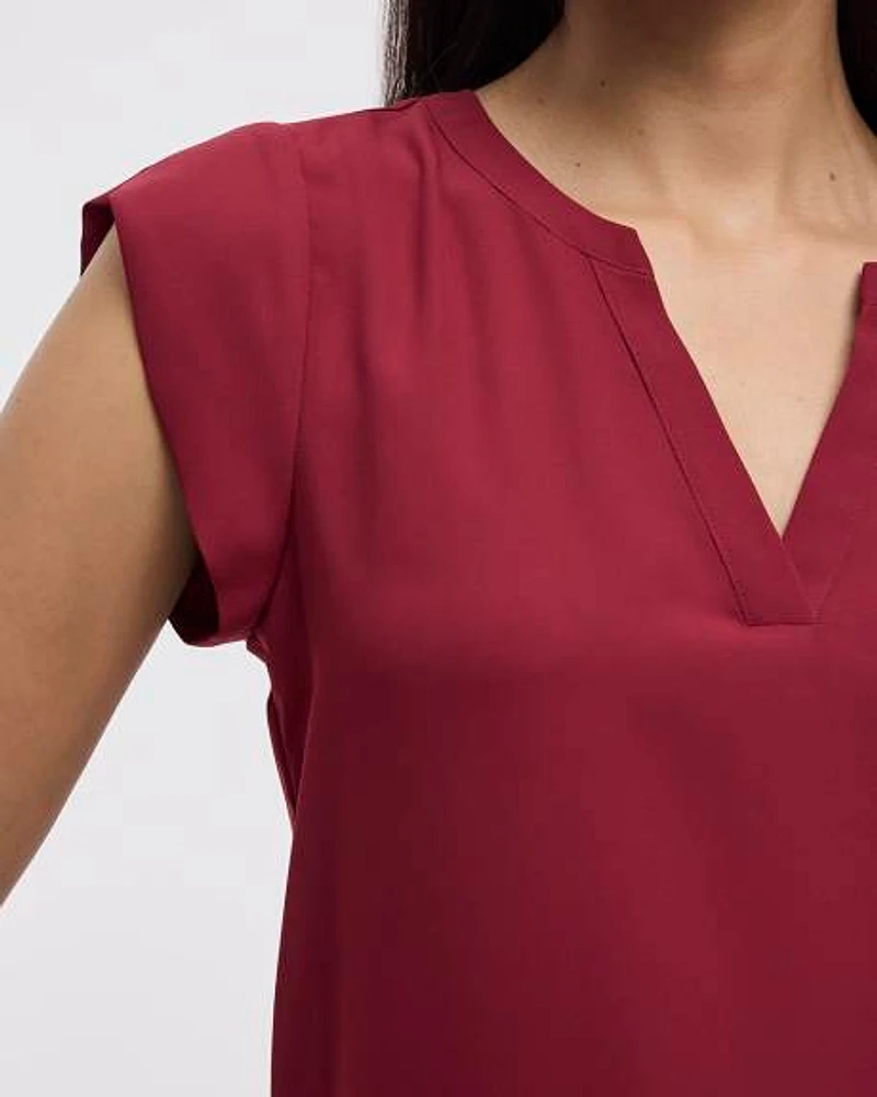 Blouse à manches très courtes et col fendu