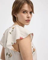 Blouse boutonnée à manches courtes volants et col fendu